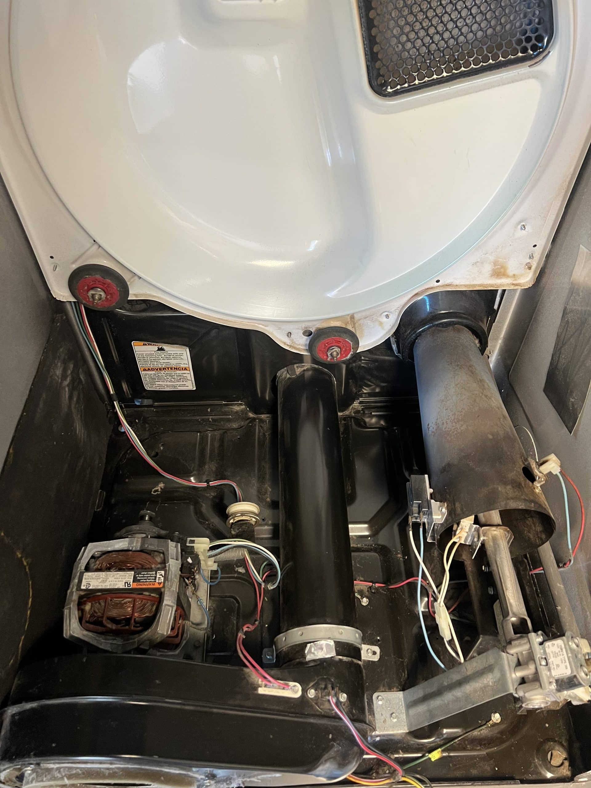 Inside view of a disassembled clothes dryer.