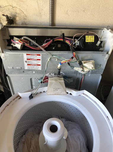 002 Repairing a washing machine with open back panel