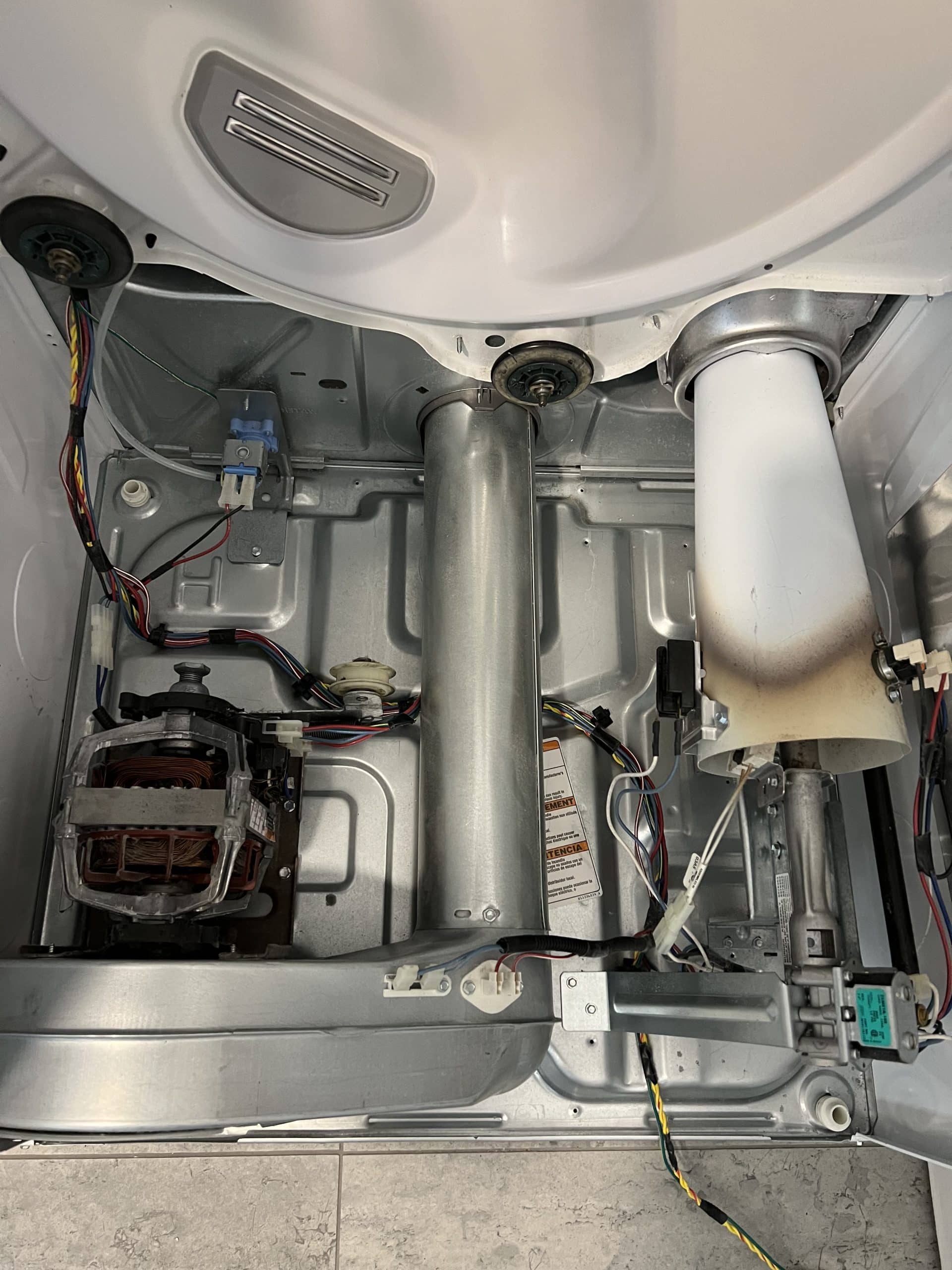 Inside view of electric dryer components.